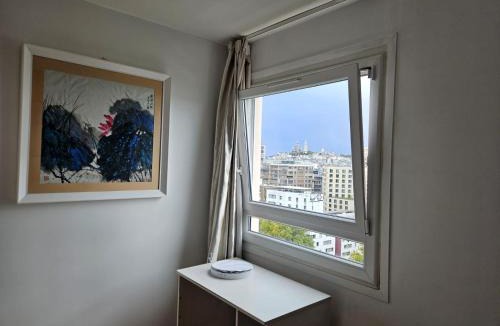 Porte de la Chapelle House | Chambres lumineuses avec vue sur Paris Montmartre