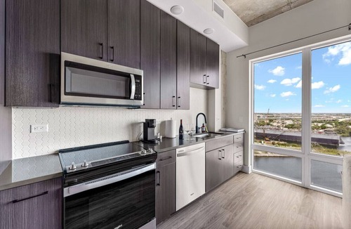 Channel District Apartment | Channelside Oasis for Remote Workers! Steps to DT