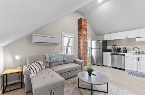 West Central Apartment | Character-Filled Downtown Apartment | Brick & Wood Details