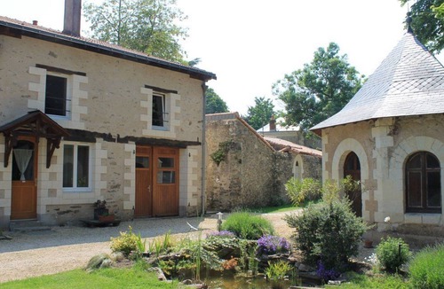 Saint-Sebastien-sur-Loire Cottage | Charming Cottage Near Nantes with Private Terrace, Bikes & Modern Amenities