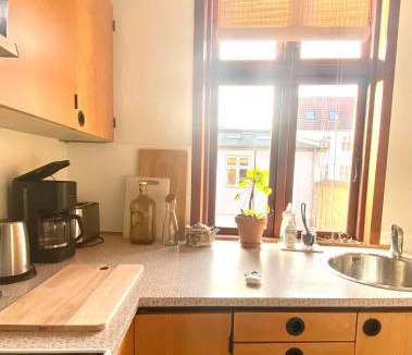 Randers Apartment | Charmerende centralbeliggende lejlighed - hyggelig og med parkering