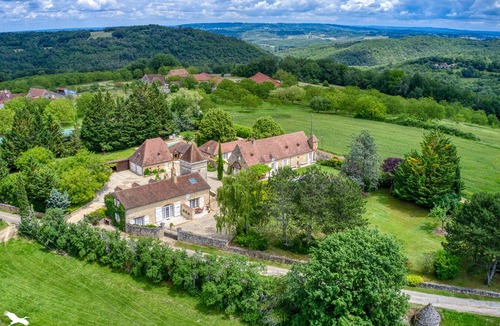 Saint-Laurent-la-Vallee Cottage | Charming stone house with shared, heated swimming pool and landscaped park