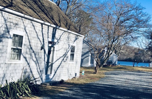 Dennis Cottage | Charming 18th century cottage with its own beachfront on Scargo Lake near bay