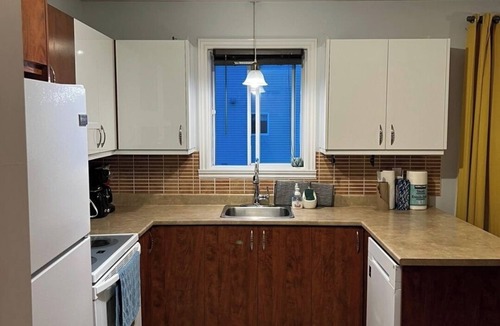 Laval Apartment | Charming 2-bedroom apartment with WiFi, AC in peaceful Laval