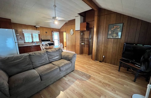 Herron Cabin | Charming 2-bedroom cabin sits on 2.5 acres on Hubbard Lake.