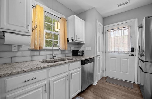 Wake Forest House | Charming 2-bedroom townhome in Wake Forest with assigned parking