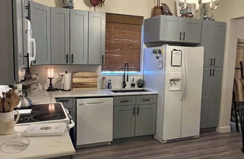 Denison House | Charming 3-bedroom cottage with relaxing outdoor space in downtown Denison.