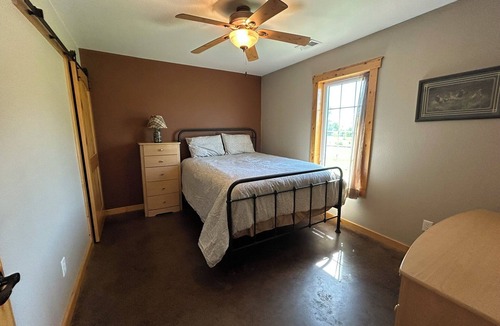 Peculiar Other | Charming 3-bedroom farmhouse outside Harrisonville for relaxing stays