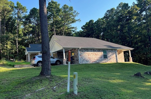 Flint House | Charming 3-bedroom house close to lake in cozy Flint neighborhood.