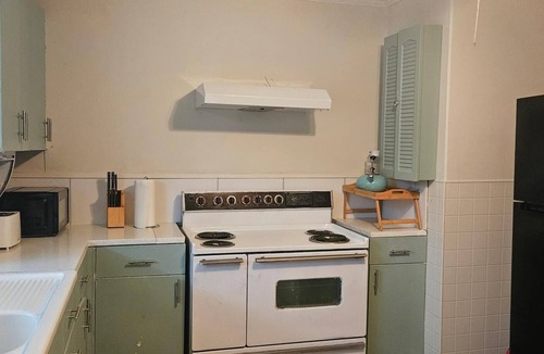 Natchez House | Charming 3-bedroom Natchez home blends Southern comfort with convenience.