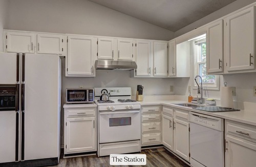 Woodstock House | Charming 3BR Station Home - Fast WiFi, Deck & Parking!