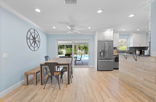 Tequesta House | Charming 4-Bedroom Beach Bungalow with Idyllic Pool & Backyard