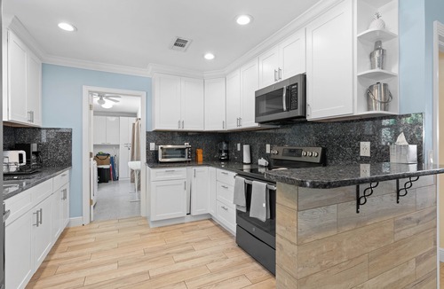 Tequesta House | Charming 4-Bedroom Beach Bungalow with Idyllic Pool & Backyard