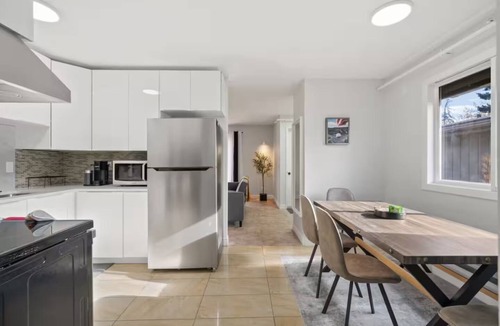 Montgomery House | Charming 4-bedroom house with AC in vibrant Calgary
