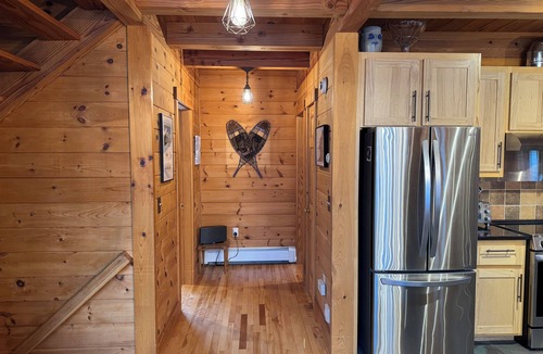 Carrabassett Valley Ski Chalet | Charming 4-bedroom mountainside chalet on Sugarloaf golf course