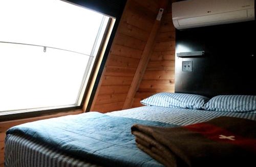 Allen County House | Charming A-Frame Cabin Experience with Campfire Vibes in Humboldt, Kansas