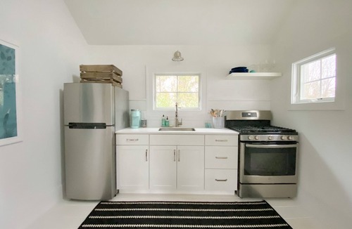 East Quogue Cottage | Charming and Bright Cottage with Salt Water Pool