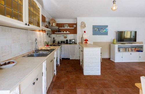 Tribalj Apartment | Charming apartment with Mediterranean garden, pool, high chair, cot, BBQ