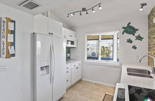 Bethune Beach House | Charming beachside bungalow steps from the beach.