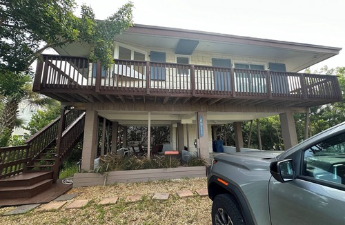 Bethune Beach House | Charming beachside bungalow steps from the beach.