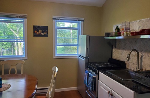 Three Mile Bay House | Charming beachfront cottage in Point Peninsula