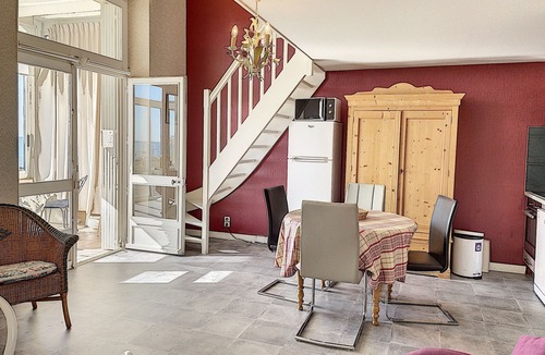 Jullouville Apartment | Charming beachfront duplex with veranda