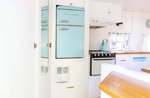 Miller Lake House | Charming Blue Glamping RV Close to Grotto