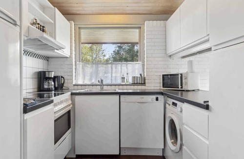 Udbyhøj Villa | Charming brick house with sauna and fjord view