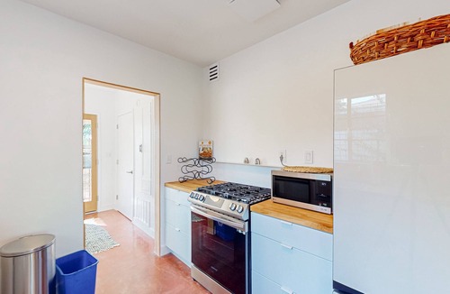 Sam Hughes House | Charming & bright bungalow w/patio, yard, close to downtown shops, dogs ok