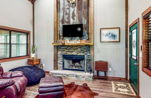 Waller Cabin | Charming cabin with hot tub, full kitchen, firepit, deck, grill, & W/D