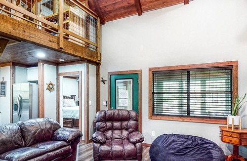 Waller Cabin | Charming cabin with hot tub, full kitchen, firepit, deck, grill, & W/D