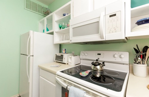 Corpus Christi Condo | Charming condo. Sleeps 4-Pool. Walk to beach! 2nd Floor.