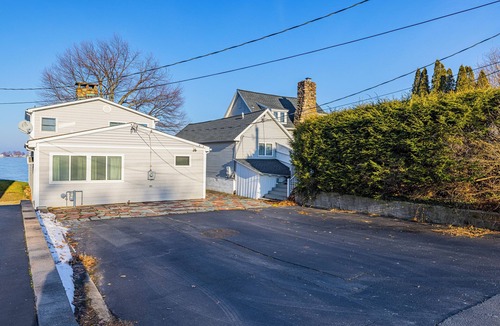 Sodus Point Cottage | Charming Cottage on the Bay and Golf Course with private patio and boat dock.