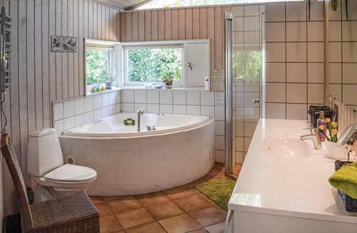 Smidstrup Strand House | Charming cottage with large dining/kitchen area with underfloor heating and a bright living room wit