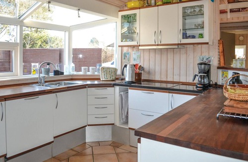 Smidstrup Strand House | Charming cottage with large dining/kitchen area with underfloor heating and a bright living room wit