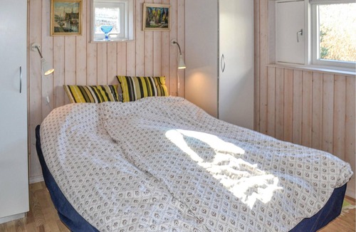 Smidstrup Strand House | Charming cottage with large dining/kitchen area with underfloor heating and a bright living room wit