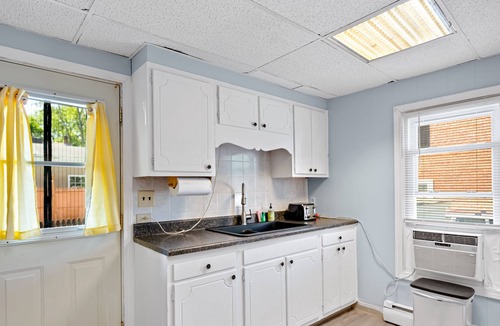 Glens Falls House | Charming dog-friendly home with pool, firepit, full kitchen, & W/D