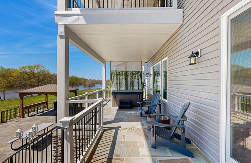 Orange House | Charming dog-friendly lakefront villa with private dock, firepit, stunning views