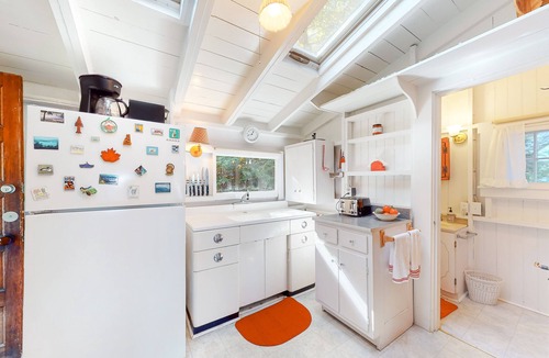 West Alton Cottage | Charming dog-friendly lakefront cottage with private dock & community beach