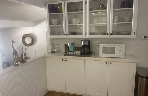 Naples Park House | Charming dog-friendly, large private tropical backyard. 3 bed 2 bath Great value