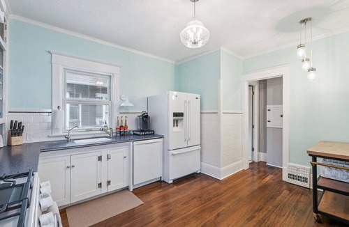 Pella House | Charming Downtown Pella Cottage | Epic Game Room | Walk to Shops & Restaurants