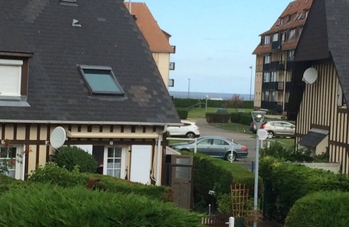 Villers-sur-Mer Apartment | Charming duplex cottage steps from the sea with garden