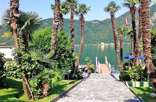 Bissone Apartment | Charming Gardenview App. 102 by Interhome