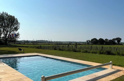 Saint-Juvat Cottage | Charming gîte in a green setting, with swimming pool.