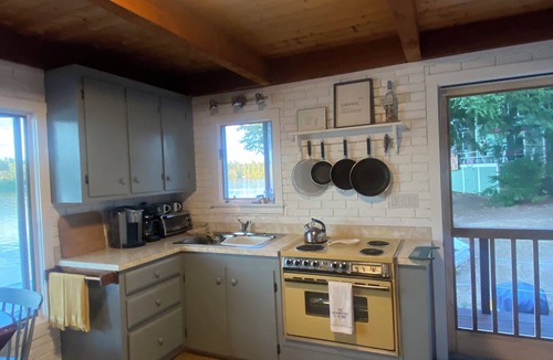 Acton House | Charming Great East Lake 4 Season Waterfront Home!