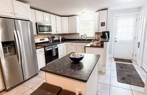 Bath House | Charming Historic home steps away from downtown