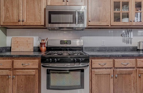 Manhattan House | Charming Home w/Fire Pit & Fenced Yard!