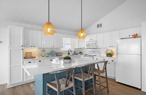 Acapulco Village House | Charming Home with Game Room, Deck & Canal Access