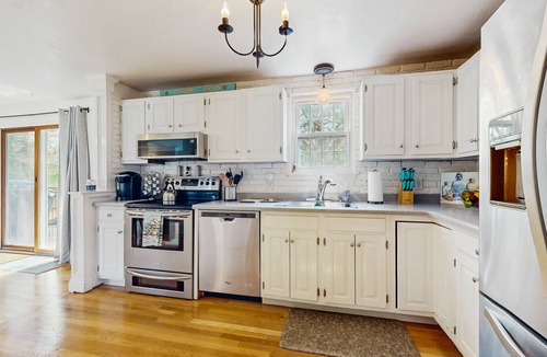 Osterville House | Charming home with open layout, deck, grill, AC, W/D, & yard