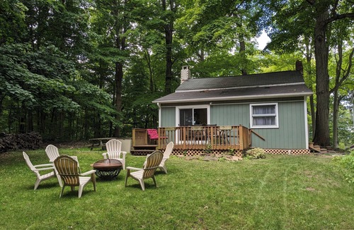 Wolcott Cottage | Charming Island cottage with dock, accessible by car and boat